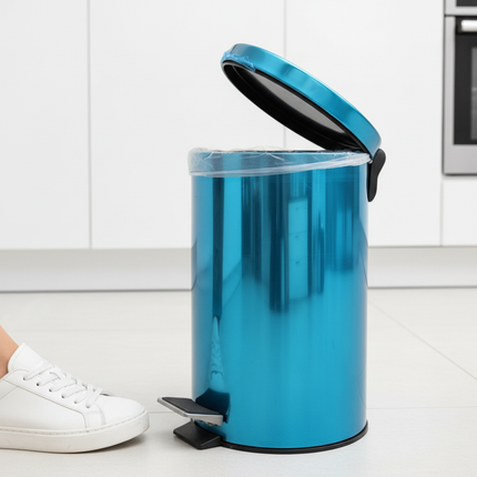 Foot pressing pedal of metallic blue trash bin demonstration
