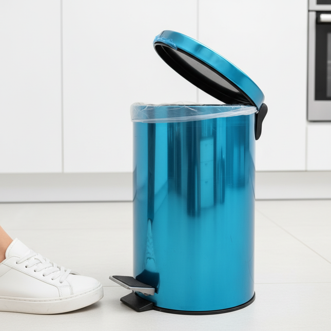 Foot pressing pedal of metallic blue trash bin demonstration