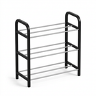 Compact three-tier shoe rack with black side frames and silver rails on a white background