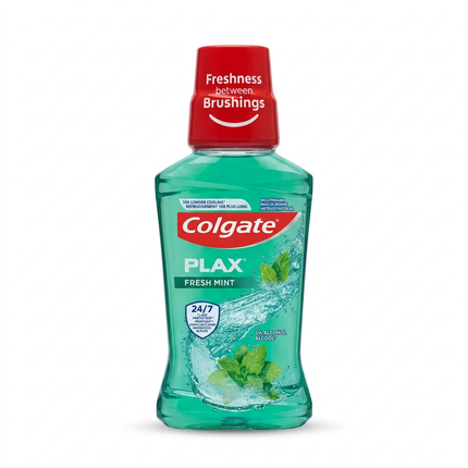 Colgate Plax Fresh Mint green mouthwash bottle with red cap on white