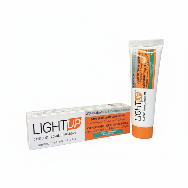 LIGHT UP Dark Spots Correcting Cream box and tube on white background