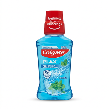 Colgate Plax Peppermint blue mouthwash bottle with red cap on white